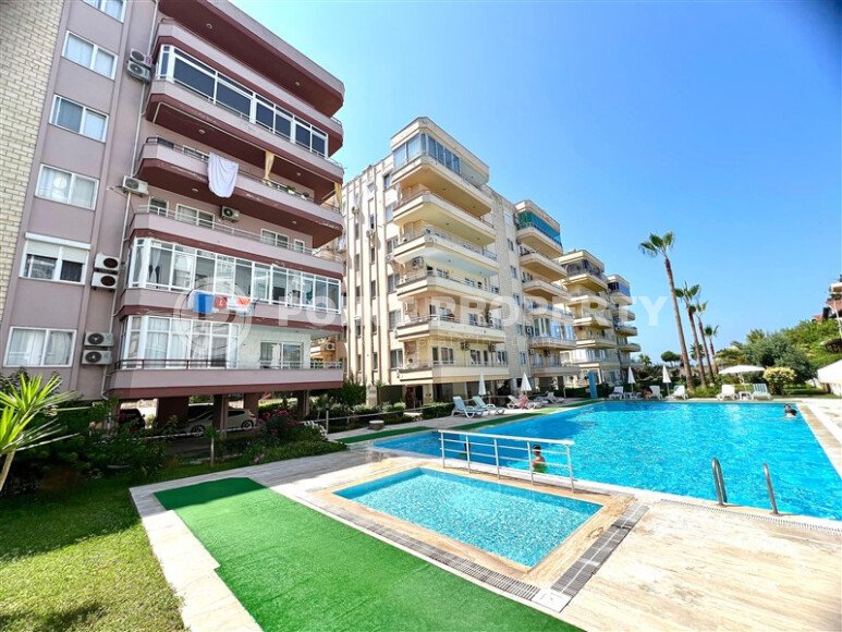 Cozy 2+1 110 m² in Mahmutlar on the first coastline with partial sea view-id-9828-photo-1