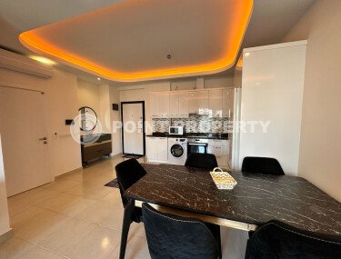 Современная квартира 1+1, 65 м² в элитном комплексе в районе Махмутлар-id-9466-фото-2