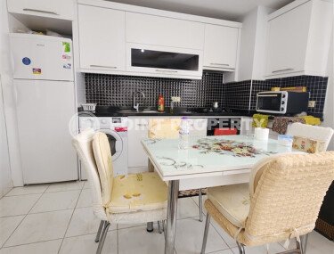 Уютная квартира 1+1, 60 м², с видом на море и горы в зелёном комплексе 2015 года в Махмутларе-id-9832-фото-2