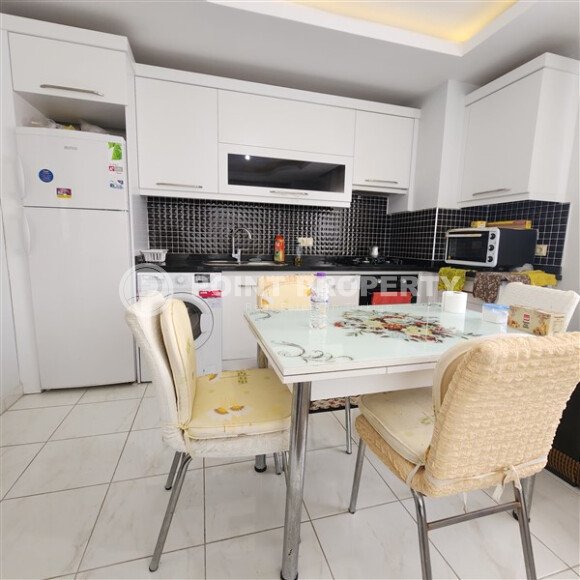 Уютная квартира 1+1, 60 м², с видом на море и горы в зелёном комплексе 2015 года в Махмутларе-id-9832-фото-2