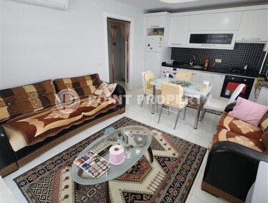 Уютная квартира 1+1, 60 м², с видом на море и горы в зелёном комплексе 2015 года в Махмутларе-id-9832-фото-3