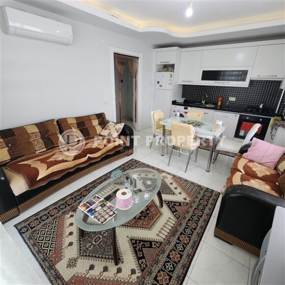 Уютная квартира 1+1, 60 м², с видом на море и горы в зелёном комплексе 2015 года в Махмутларе-id-9832-фото-3