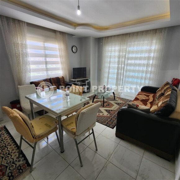 Уютная квартира 1+1, 60 м², с видом на море и горы в зелёном комплексе 2015 года в Махмутларе-id-9832-фото-4