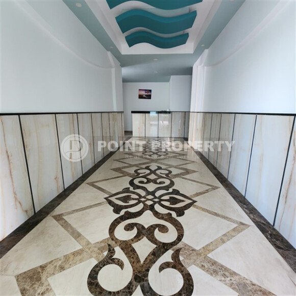 Уютная квартира 1+1, 60 м², с видом на море и горы в зелёном комплексе 2015 года в Махмутларе-id-9832-фото-13