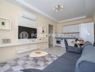 Стильная квартира 1+1, 50 м², в новом доме 2022 года в Махмутларе, 500 м до моря-id-9833-фото-1