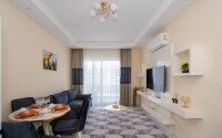 Стильная квартира 1+1, 50 м², в новом доме 2022 года в Махмутларе, 500 м до моря-id-9833-фото-2