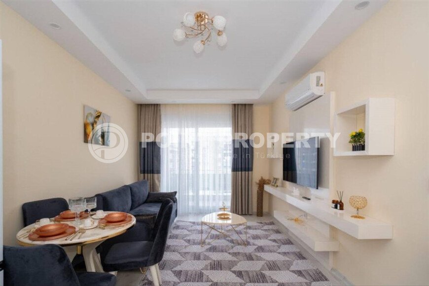 Стильная квартира 1+1, 50 м², в новом доме 2022 года в Махмутларе, 500 м до моря-id-9833-фото-2