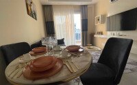 Стильная квартира 1+1, 50 м², в новом доме 2022 года в Махмутларе, 500 м до моря-id-9833-фото-3