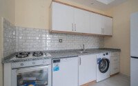 Стильная квартира 1+1, 50 м², в новом доме 2022 года в Махмутларе, 500 м до моря-id-9833-фото-4