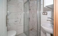 Стильная квартира 1+1, 50 м², в новом доме 2022 года в Махмутларе, 500 м до моря-id-9833-фото-7