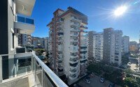 Стильная квартира 1+1, 50 м², в новом доме 2022 года в Махмутларе, 500 м до моря-id-9833-фото-9