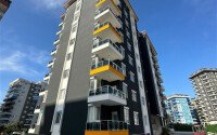 Стильная квартира 1+1, 50 м², в новом доме 2022 года в Махмутларе, 500 м до моря-id-9833-фото-12