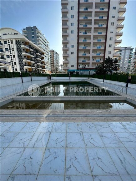 Стильная квартира 1+1, 50 м², в новом доме 2022 года в Махмутларе, 500 м до моря-id-9833-фото-13