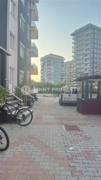 Стильная квартира 1+1, 50 м², в новом доме 2022 года в Махмутларе, 500 м до моря-id-9833-фото-14