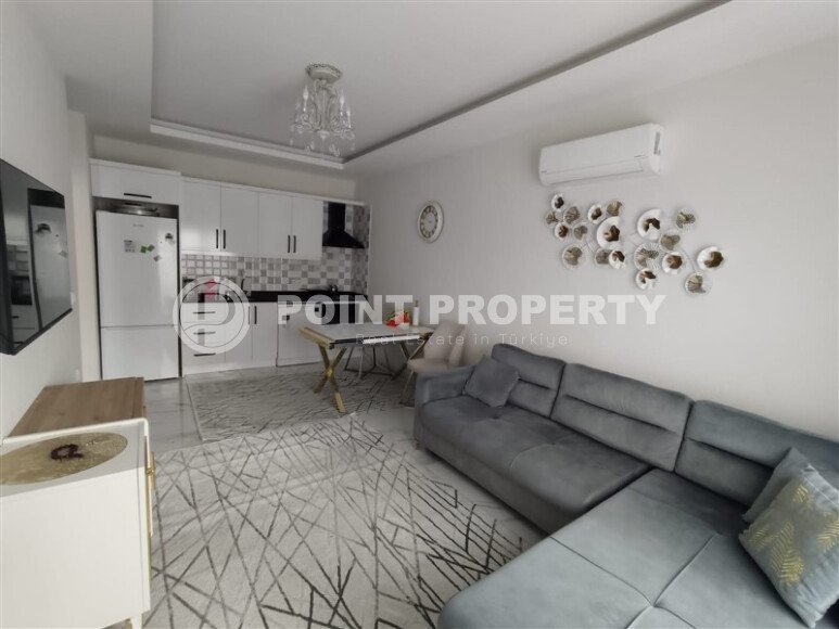 Bright 1+1 apartment with an area of 60 m² in a complex of 2023 in the Mahmutlar area-id-9834-photo-1