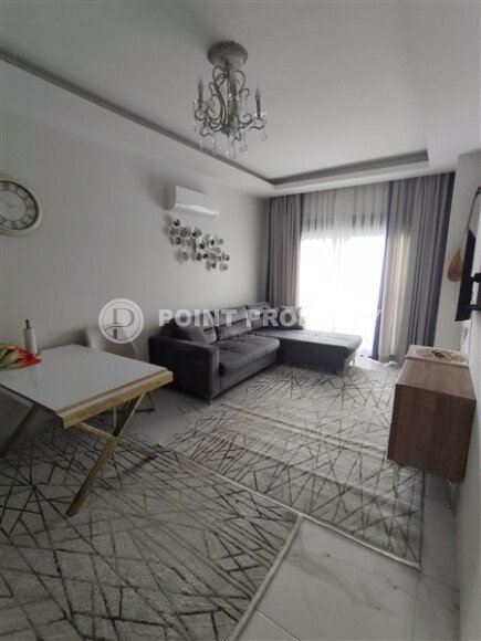 Светлая квартира 1+1 площадью 60 м² в комплексе 2023 года в районе Махмутлар-id-9834-фото-2