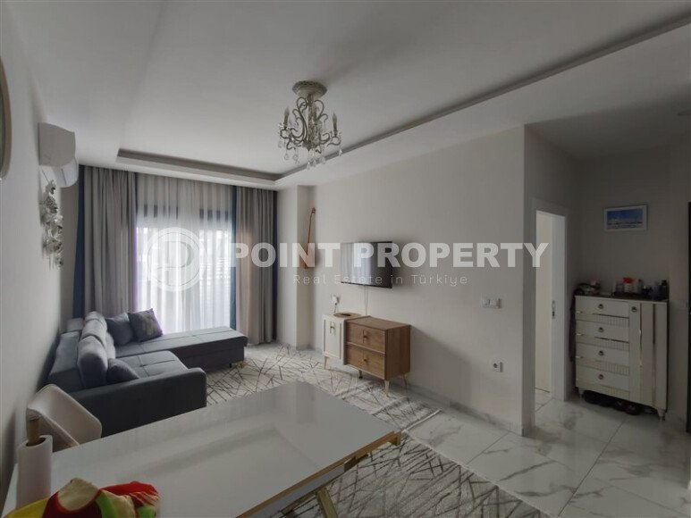 Светлая квартира 1+1 площадью 60 м² в комплексе 2023 года в районе Махмутлар-id-9834-фото-3