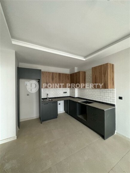 Современная светлая квартира 1+1, 45 м², в комплексе 2023 года в Махмутларе-id-9836-фото-2