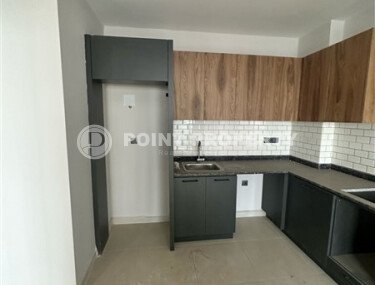 Современная светлая квартира 1+1, 45 м², в комплексе 2023 года в Махмутларе-id-9836-фото-3