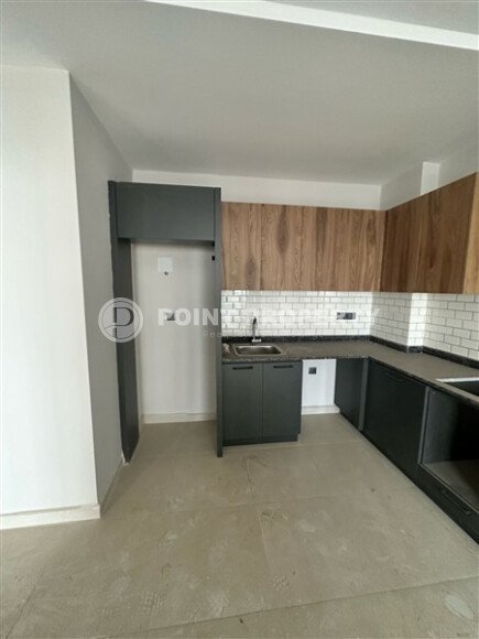 Современная светлая квартира 1+1, 45 м², в комплексе 2023 года в Махмутларе-id-9836-фото-3