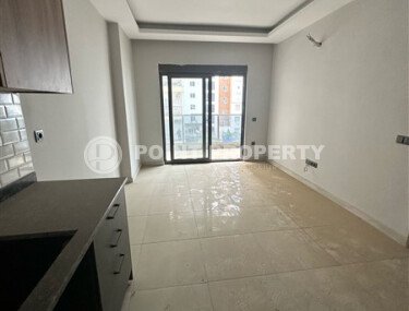 Современная светлая квартира 1+1, 45 м², в комплексе 2023 года в Махмутларе-id-9836-фото-4