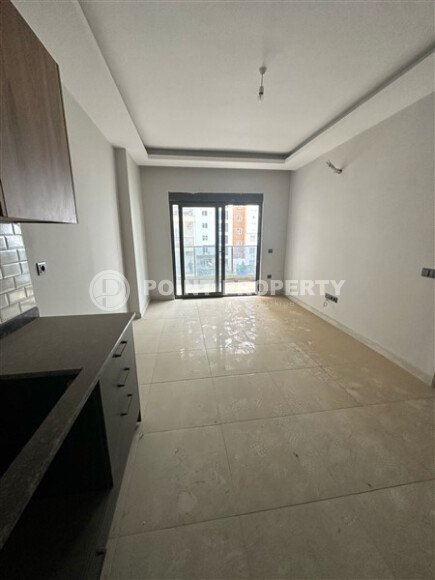 Современная светлая квартира 1+1, 45 м², в комплексе 2023 года в Махмутларе-id-9836-фото-4