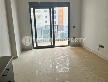 Современная светлая квартира 1+1, 45 м², в комплексе 2023 года в Махмутларе-id-9836-фото-5