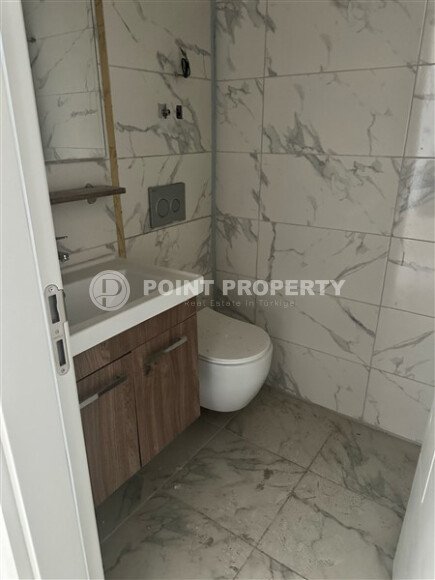 Современная светлая квартира 1+1, 45 м², в комплексе 2023 года в Махмутларе-id-9836-фото-7