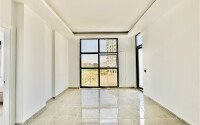 Светлая квартира 2+1 70 м² в новом комплексе – район Махмутлар-id-9837-фото-2