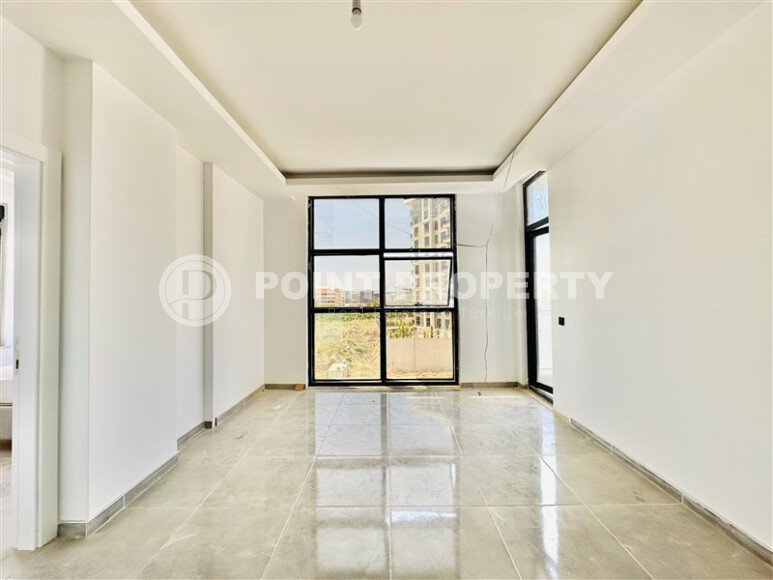 Светлая квартира 2+1 70 м² в новом комплексе – район Махмутлар-id-9837-фото-2