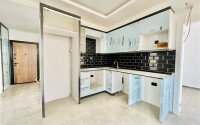 Светлая квартира 2+1 70 м² в новом комплексе – район Махмутлар-id-9837-фото-3