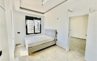 Светлая квартира 2+1 70 м² в новом комплексе – район Махмутлар-id-9837-фото-7