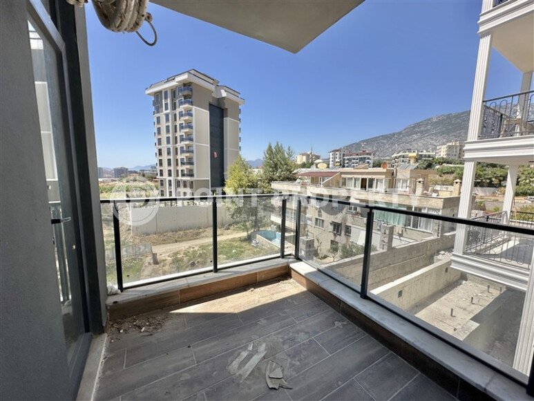 Светлая квартира 2+1 70 м² в новом комплексе – район Махмутлар-id-9837-фото-12