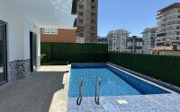 Светлая квартира 2+1 70 м² в новом комплексе – район Махмутлар-id-9837-фото-14