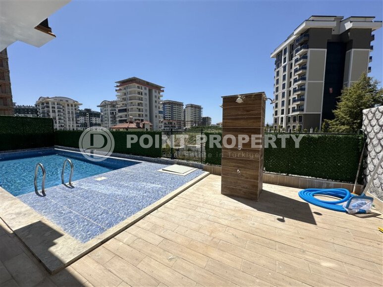 Светлая квартира 2+1 70 м² в новом комплексе – район Махмутлар-id-9837-фото-15