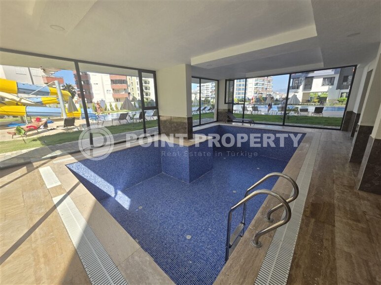 New 1+1 apartment in a multifunctional complex – Mahmutlar, 47 m²-id-9842-photo-19
