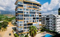 Modern 1+1 55 m² in Mahmutlar with furniture and infrastructure-id-9850-photo-1