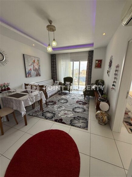 Modern 1+1 55 m² in Mahmutlar with furniture and infrastructure-id-9850-photo-2