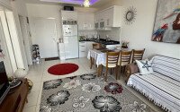 Modern 1+1 55 m² in Mahmutlar with furniture and infrastructure-id-9850-photo-3