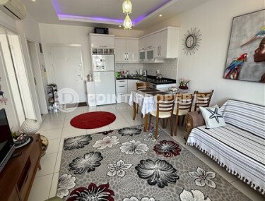 Modern 1+1 55 m² in Mahmutlar with furniture and infrastructure-id-9850-photo-3