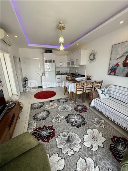 Modern 1+1 55 m² in Mahmutlar with furniture and infrastructure-id-9850-photo-3