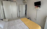 Modern 1+1 55 m² in Mahmutlar with furniture and infrastructure-id-9850-photo-5