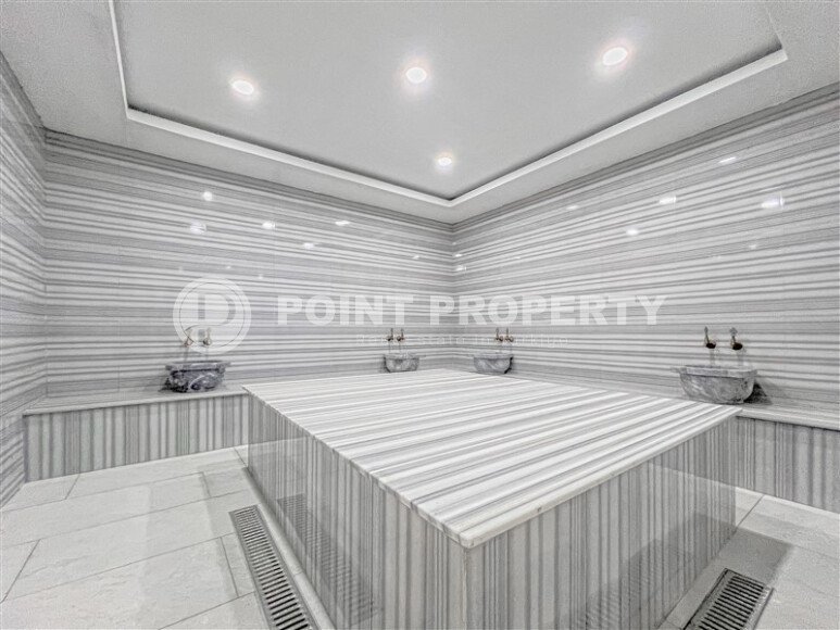 Modern 1+1 55 m² in Mahmutlar with furniture and infrastructure-id-9850-photo-8