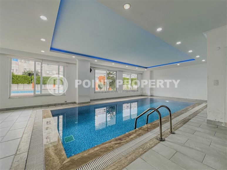 Modern 1+1 55 m² in Mahmutlar with furniture and infrastructure-id-9850-photo-10