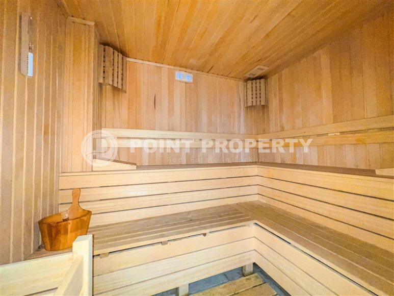 Modern 1+1 55 m² in Mahmutlar with furniture and infrastructure-id-9850-photo-11