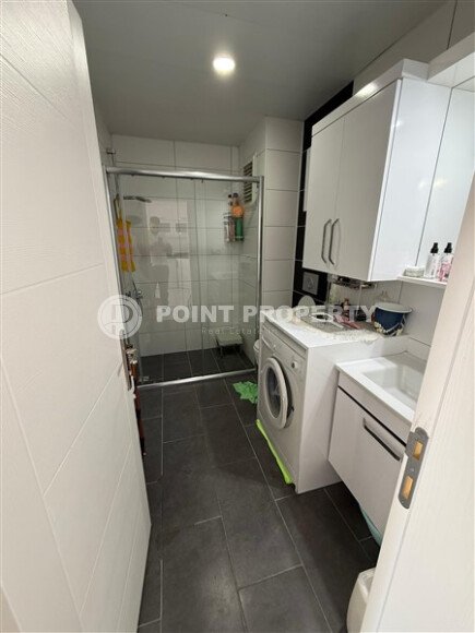 Modern 1+1 55 m² in Mahmutlar with furniture and infrastructure-id-9850-photo-13