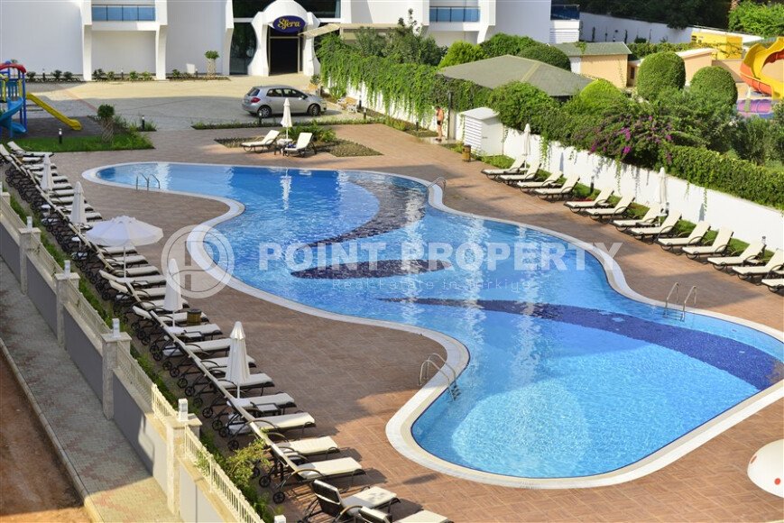 Spacious apartment 70 m² in Mahmutlar with balcony and mountain view, close to the sea-id-9852-photo-1