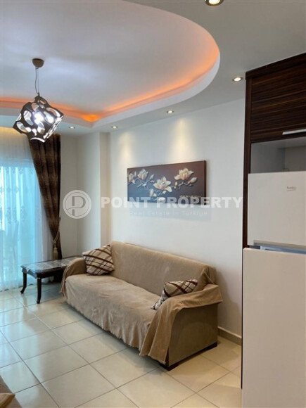 Уютная меблированная квартира 55 м² в Махмутларе с отличной инфраструктурой и всего в 300 м от моря-id-9853-фото-3