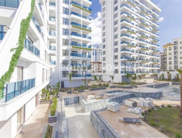 Modern 1+1 apartment in a designer complex of 2024 in Mahmutlar-id-9860-photo-1