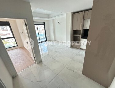 Современная квартира 1+1 в дизайнерском комплексе 2024 года в Махмутларе-id-9860-фото-2